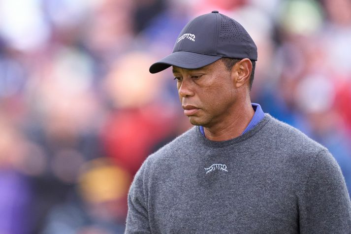 Tiger Woods náði sér ekki á strik á fyrsta hring Opna breska meistaramótsins í golfi.