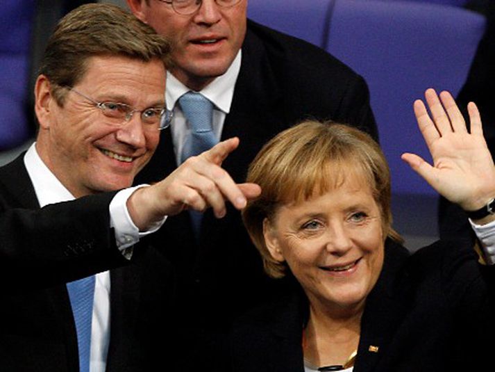 Angela Merkel og Guido Westerwelle, leiðtogi Frjálslyndra demókrata, eftir að nýja stjórnin tók við í október 2009. Mynd/AP