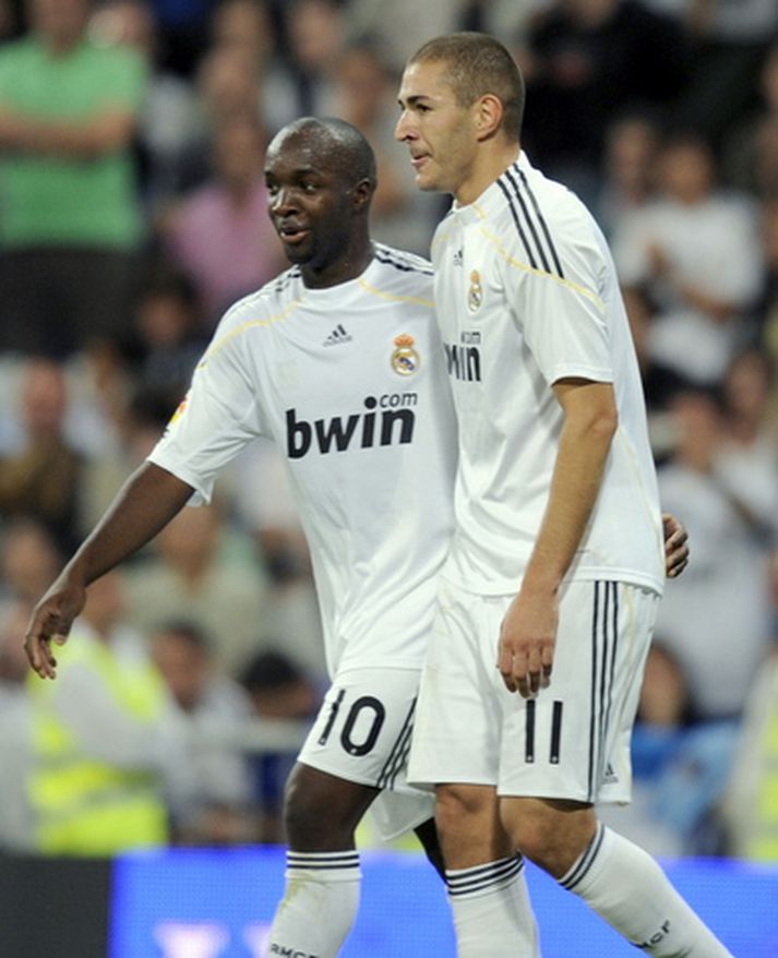 Lassana Diarra og Karim Benzema fagna marki í leik með Real Madrid.