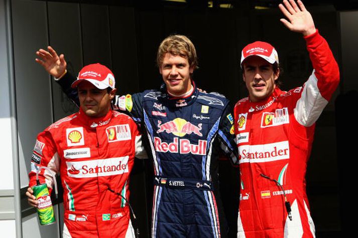 Felipe Massa, Sebastian Vettel og Fernando Alonso fagna á Hockenheikm í dag.