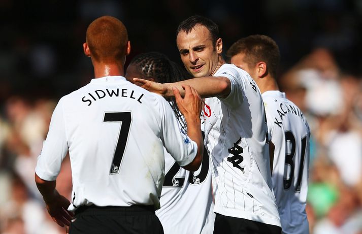 Berbatov fagnar í leik með Fulham.