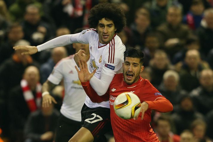 Marouane Fellaini í baráttunni við Emre Can,