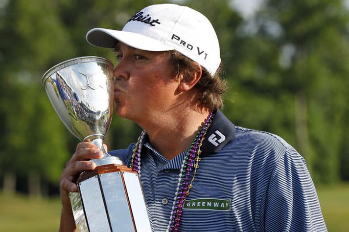 Jason Dufner sigraði í fyrsta sinn á PGA móti í gær eftir bráðbana gegn Ernie Els