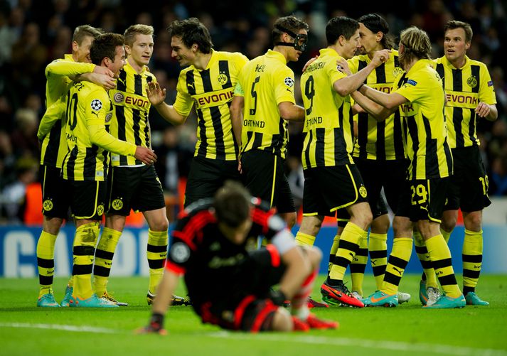 Leikmenn Dortmund fagna í kvöld en þeir urðu að gera sér jafntefli að góðu gegn Real Madrid.