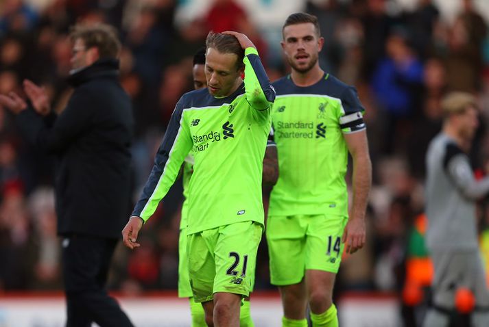 Lucas ásamt Jordan Henderson.