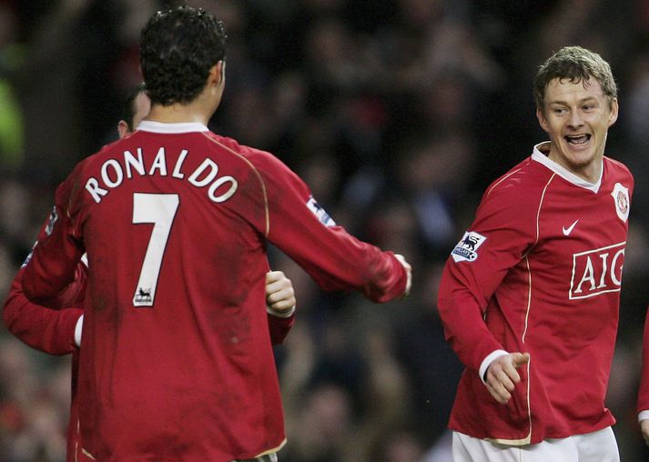 Ole Gunnar Solskjaer og Cristiano Ronaldo fagna í leik með Manchester United fyrir fjórtán árum.