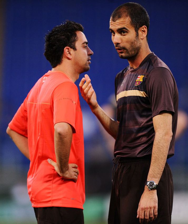 Xavi og Guardiola.