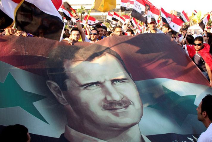 Stuðningsmenn Assad Sýrlandsforseta í höfuðborginni  Damaskus fyrr í mánuðinum.