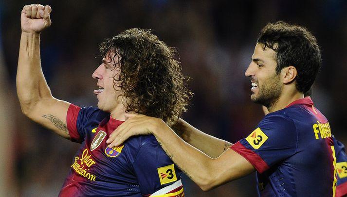 Carles Puyol skoraði í fyrstu umferð.