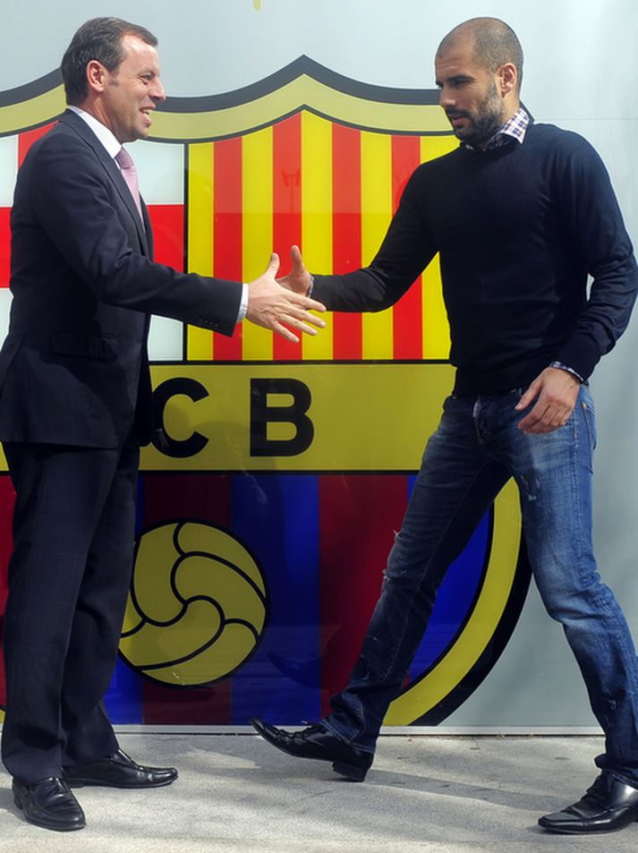 Pep Guardiola, þjálfari Barcelona með Sandro Rosell, forseta félagsins.