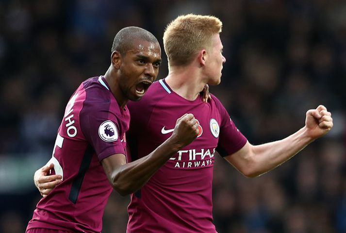 Fernandinho og Kevin De Bruyne fagna.