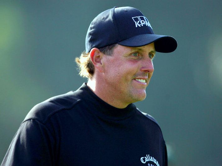 Phil Mickelson gat leyft sér að brosa í gær.