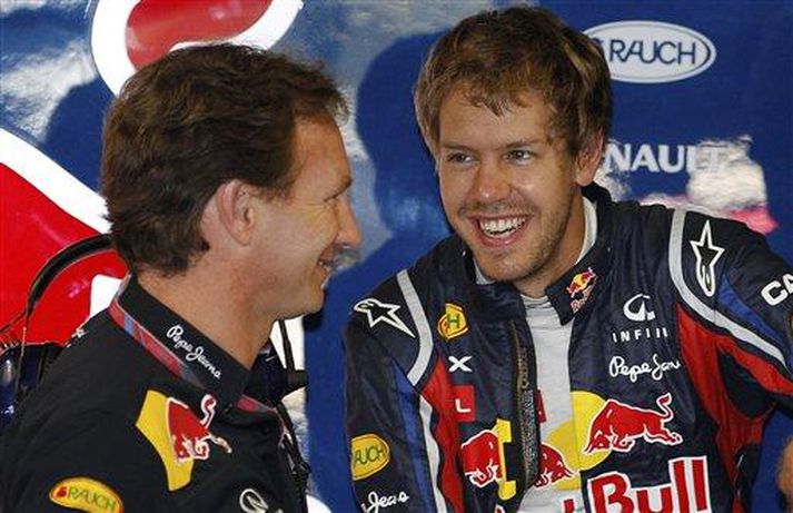 Christian Horner, yfirmaður Red Bull og Sebastian Vettel á Monza brautinni í morgun.