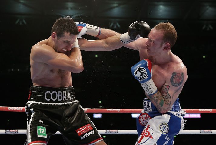 Carl Froch og George Groves í bardaganum á laugardaginn.