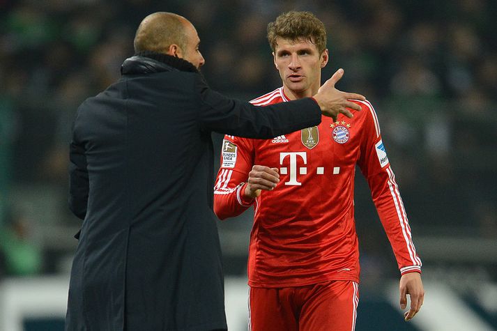 Thomas Müller og Pep Guardiola.