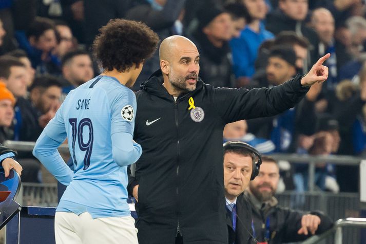 Sane og Guardiola á síðustu leiktíð.