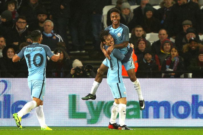 Raheem Sterling og David Silva fagna marki.