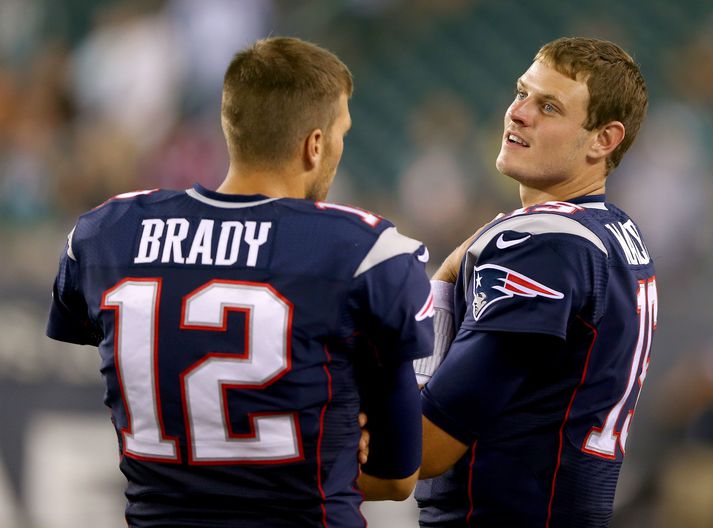 Ryan Mallett ræðir málin við Tom Brady þegar þeir léku saman hjá New England Patriots.