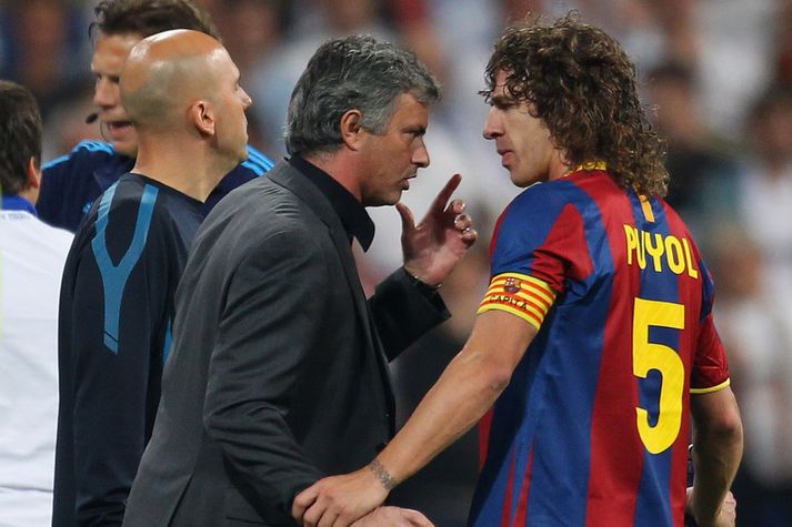 Jose Mourinho og Carles Puyol.