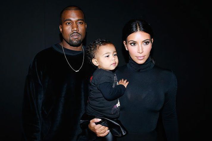 Kanye West, North West og Kim Kardashian .