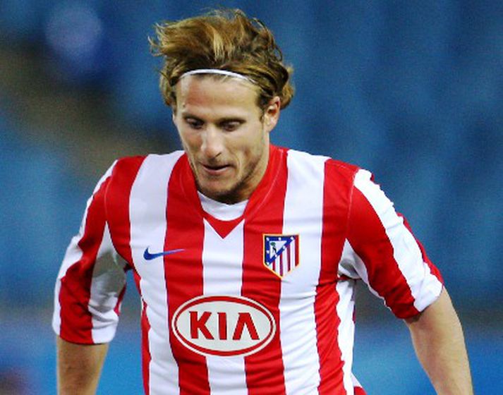 Diego Forlan skoraði tvö mörk fyrir Atletico í kvöldleiknum á Spáni