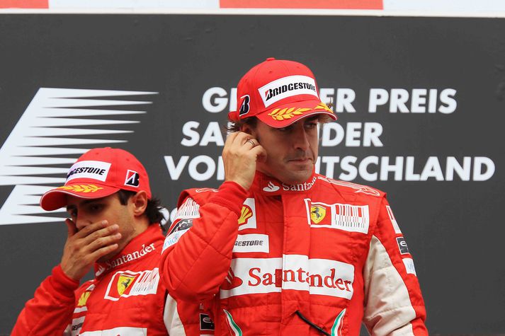 Felipe Massa og Fernando Alonso á verðlaunapallinum í Þýskalandi í sumar.