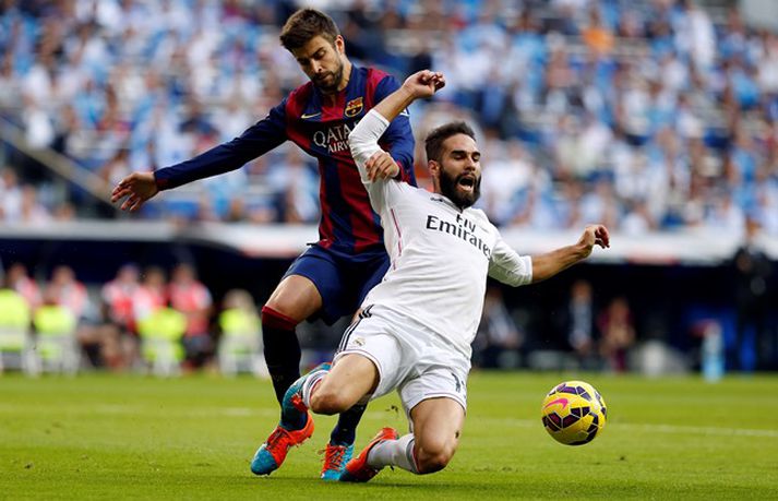 Pique og Dani Carvajal eigast við í fyrri leik Real Madrid og Barcelona í vetur. Þá hafði Real betur, 3-1.