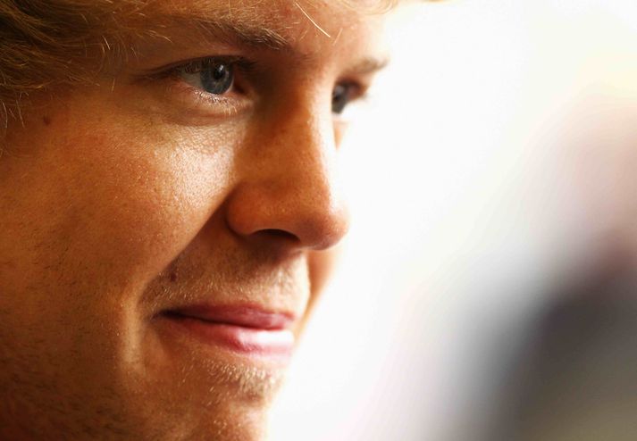 Sebastian Vettel ekur með Red Bull.