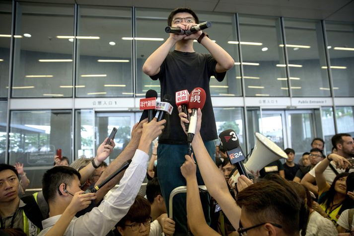 Mótmælt í Hong Kong. Á myndinni má sjá Joshua Wong, aðgerðasinni stúdenta á mótmælunum. 