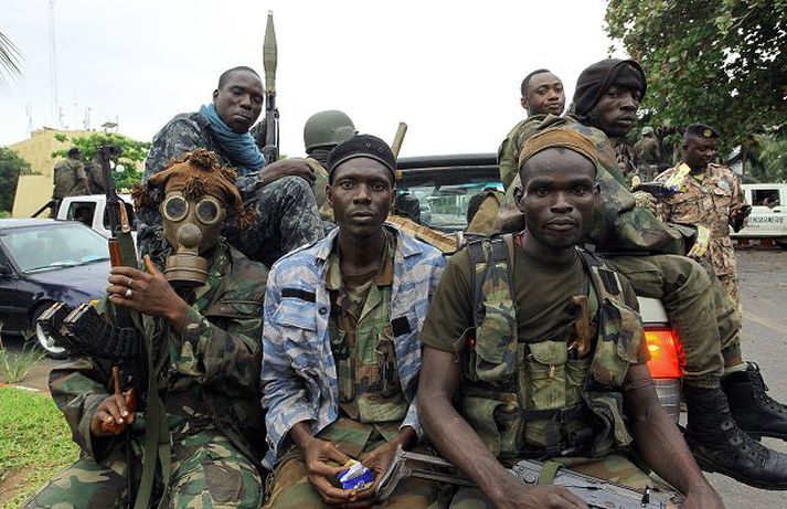 Liðsmenn Ouattaras komnir inn í Abidja, þar sem Gbagbo hafði hreiðrað um sig í kjallarabyrgi.
Mynd/Nordicphotos-AFP