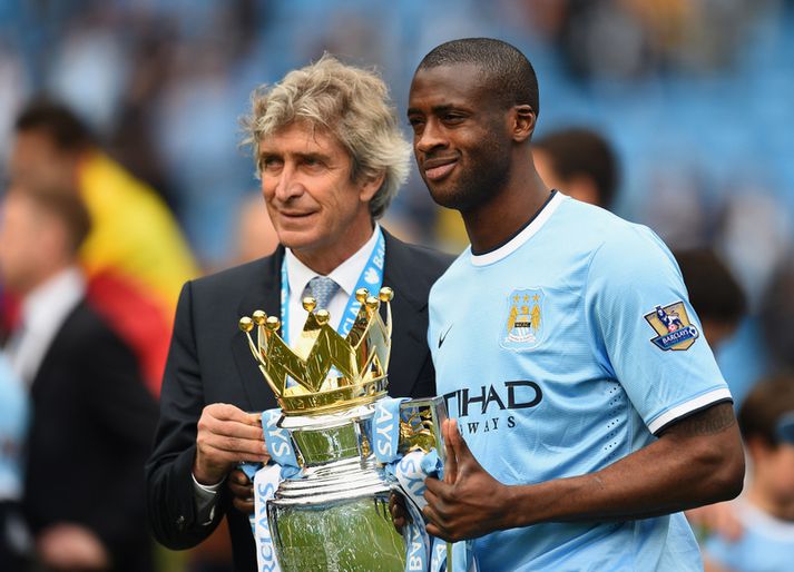 Manuel Pellegrini og Yaya Toure.