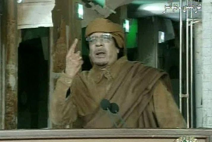 Muammar Gaddafi.