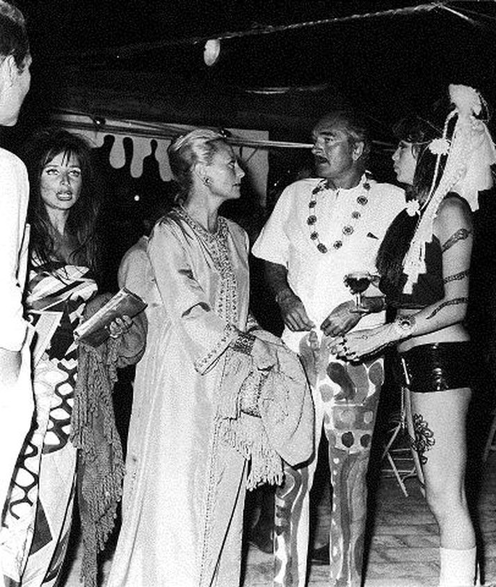 French bandleader, producer and record executive Eddie Barclay (1921 - 2005 second from right) hosts a psychedelic party at St. Tropez, August 1967. (Photo by Keystone Features/Hulton Archive/Getty Images)  st tropez