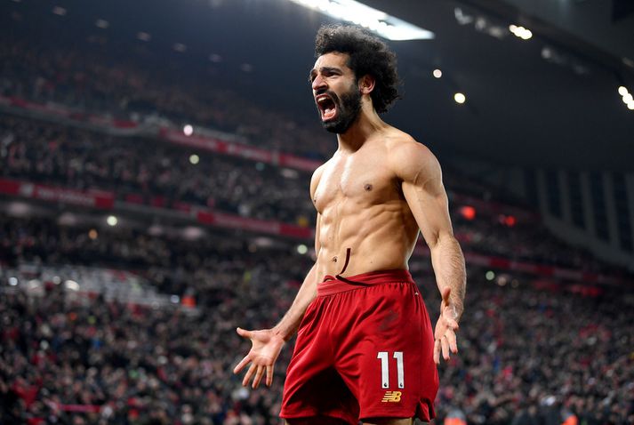 Mohamed Salah fagnar marki með Liverpool.