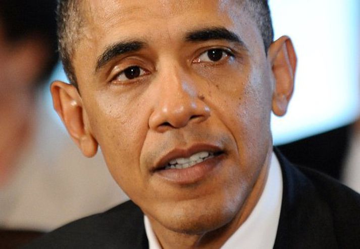 Barack Obama fagnar fimmtugsafmæli sínu. Mynd/ AFP.