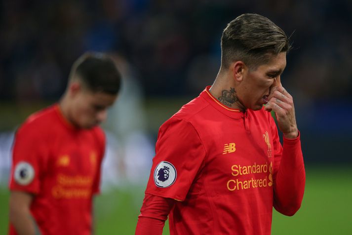 Roberto Firmino og Philippe Coutinho eftir tapið á móti Hull.