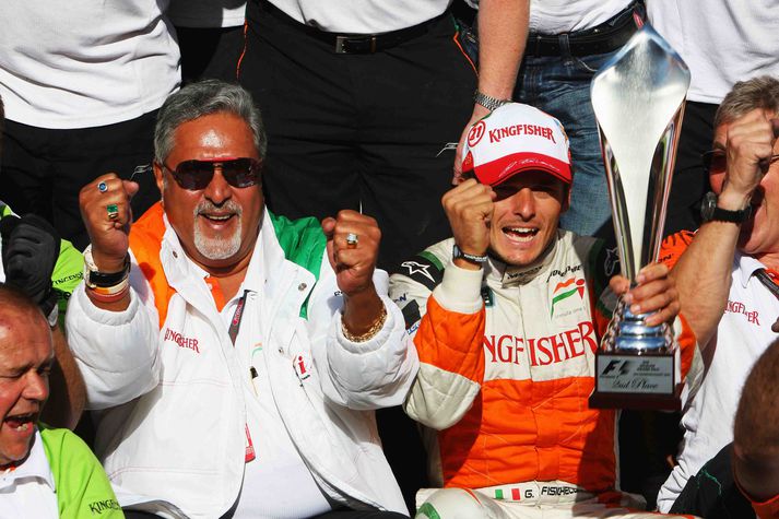 Vijay Mallya og Giancarlo Fisichella fagna góðum árangri á Spa brautinni í fyrra.