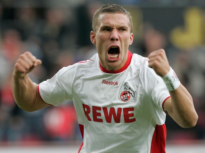 Lukas Podolski fagnar sínu fyrsta marki með Köln á tímabilinu.