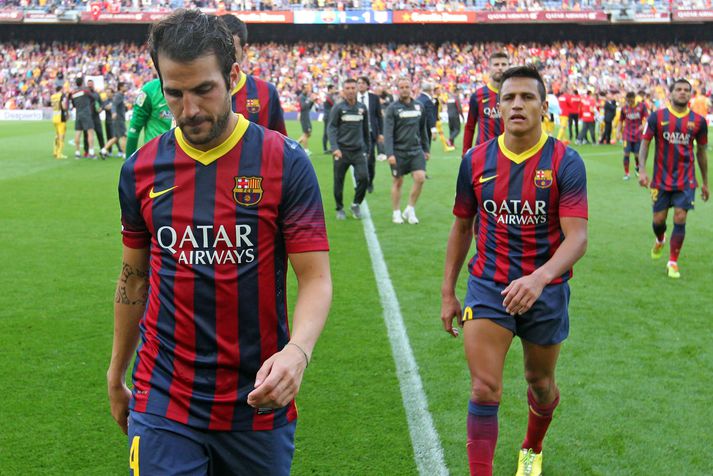 Fabregas gengur af velli eftir leik Barcelona gegn Atletico Madrid.