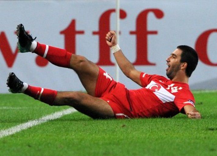 Turan fagnar marki í landsleik gegn Belgíu í undankeppni EM 2012.