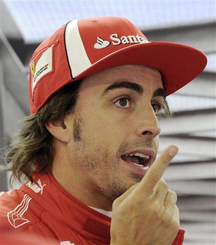 Fernando Alonso hjá Ferrari lætur móðan mása í Þýskalandi.