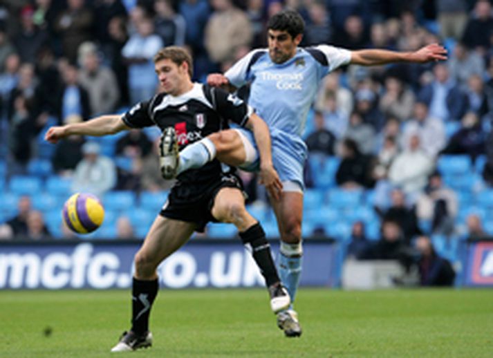 Claudio Reyna og Moritz Volz eigast við í leiknum í hádeginu í dag.