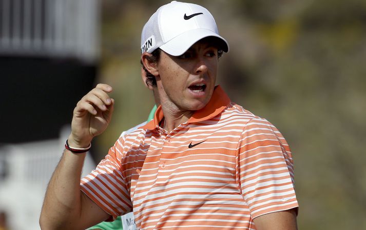 Rory McIlroy hafði betur gegn Boo Weekley í fyrstu umferð.