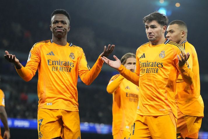 Vinicius og Brahim Diaz með skemmtilegt látbragð í sigrinum magnaða gegn Manchester City í gærkvöld.