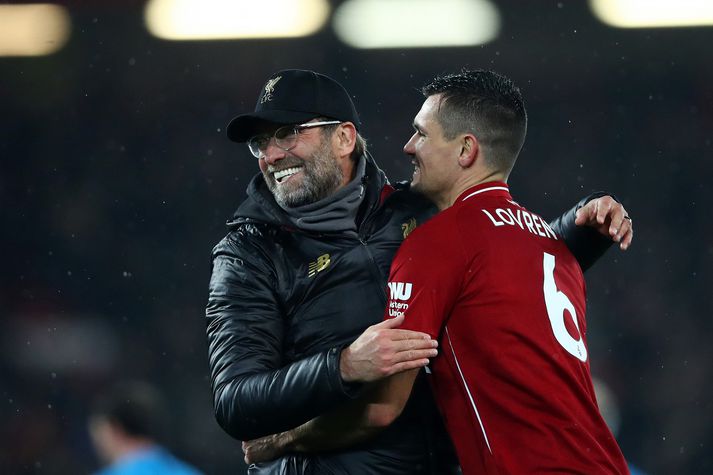 Dejan Lovren og Jürgen Klopp fagna sigri á Manchester United.