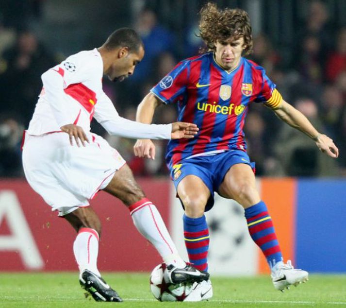 Carles Puyol í baráttunni í gær.