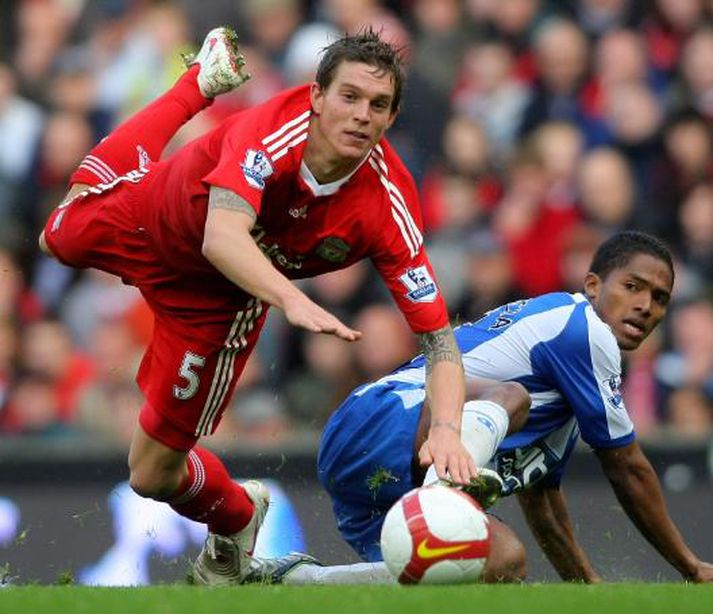 Agger á flugi í búningi Liverpool.