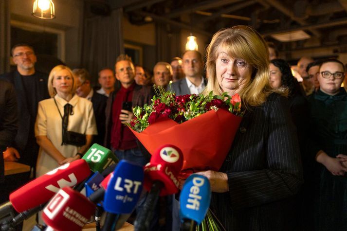 Vilija Blinkeviciute, leiðtogi litháískra Jafnaðarmanna, fagnaði í gær.