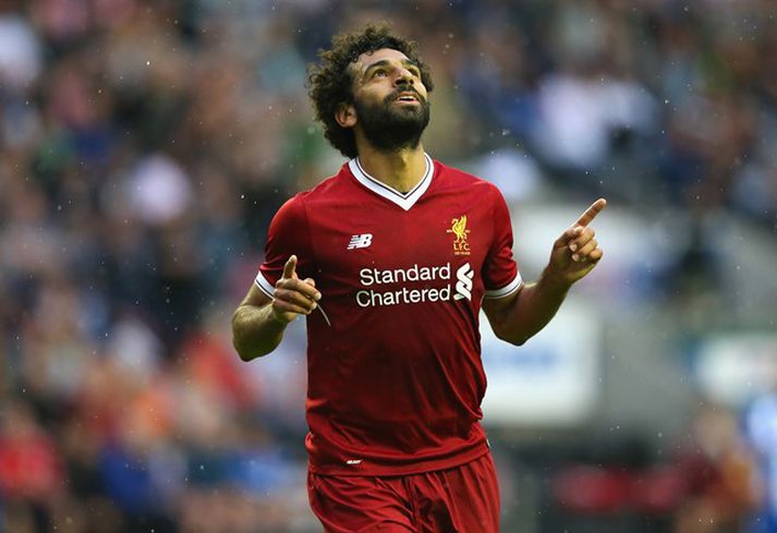 Salah fagnar sínu fyrsta marki í búningi Liverpool.