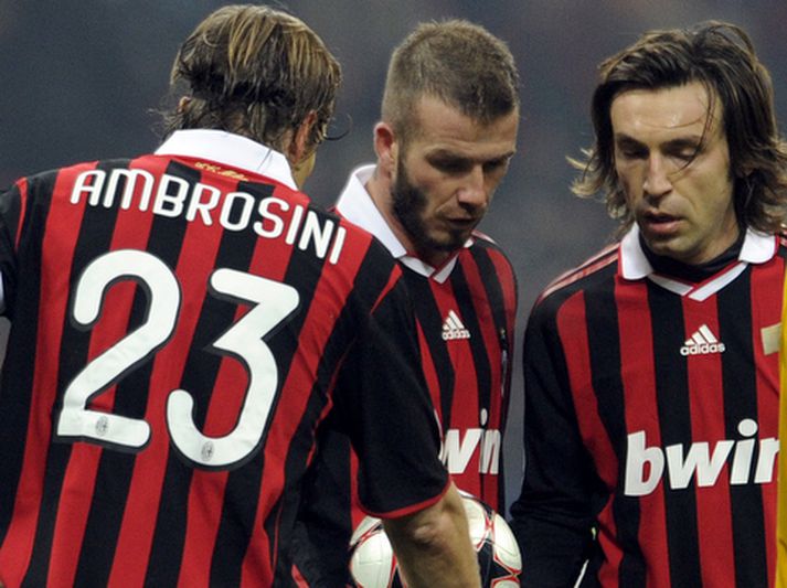 David Beckham og félagar hans á miðjunni hjá AC Milan,  Massimo Ambrosini og Andrea Pirlo.